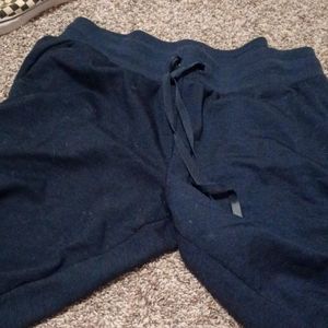 Very dark blue sweat pants